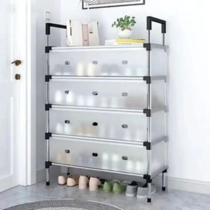 Multi-tiered storage rack with transparent shelves and black handles in a room setting.