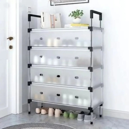 Multi-tiered storage rack with transparent shelves and black handles in a room setting.