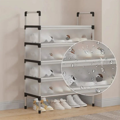 Multi-tier shoe rack with shoes on a wooden floor against a beige wall.